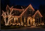 Warm roofline with wrapped tree